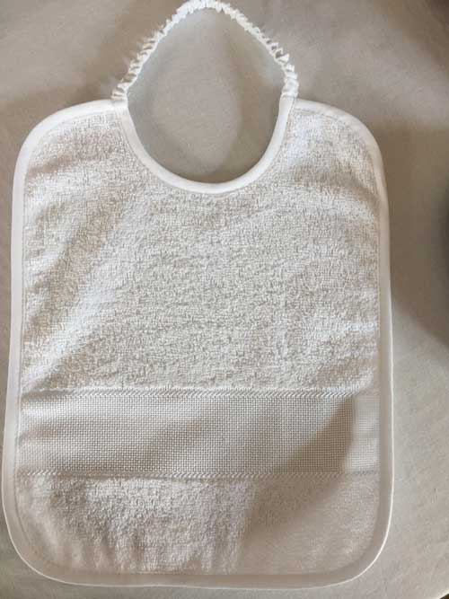 Bavoir blanc