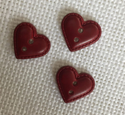 Bouton coeur facon cuir bor
