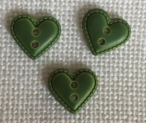 Bouton coeur facon cuir ver