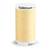 Fil a coudre 100 polyester 500m coloris creme nuage 325 gutermann