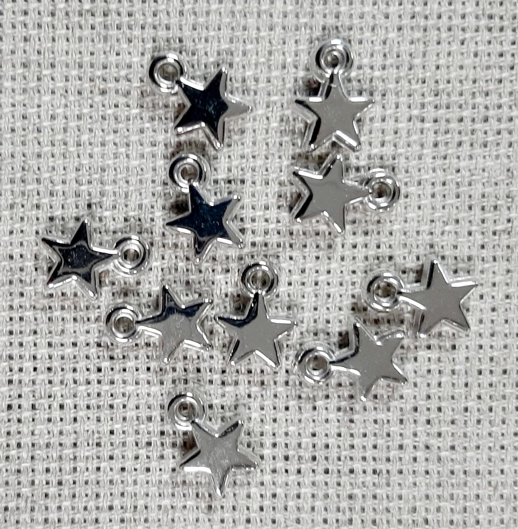 Lot de 10 etoiles argent en plastique