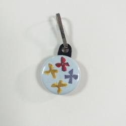 Tirette zip  badge fermeture éclair 4  Noeuds sur fond gris